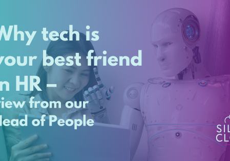 A woman an robot showing that HR tech is her best friend